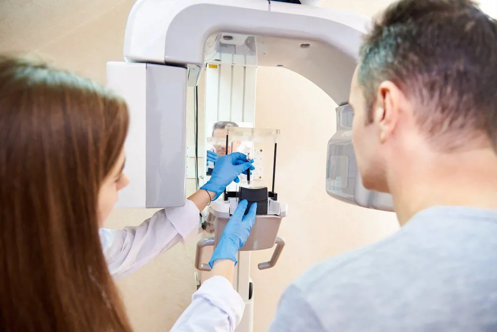 Dental technology | x-ray machine | dentist near you | patient getting a dental x ray | Almaguin Family Dental | Dentist in South River, Ontario